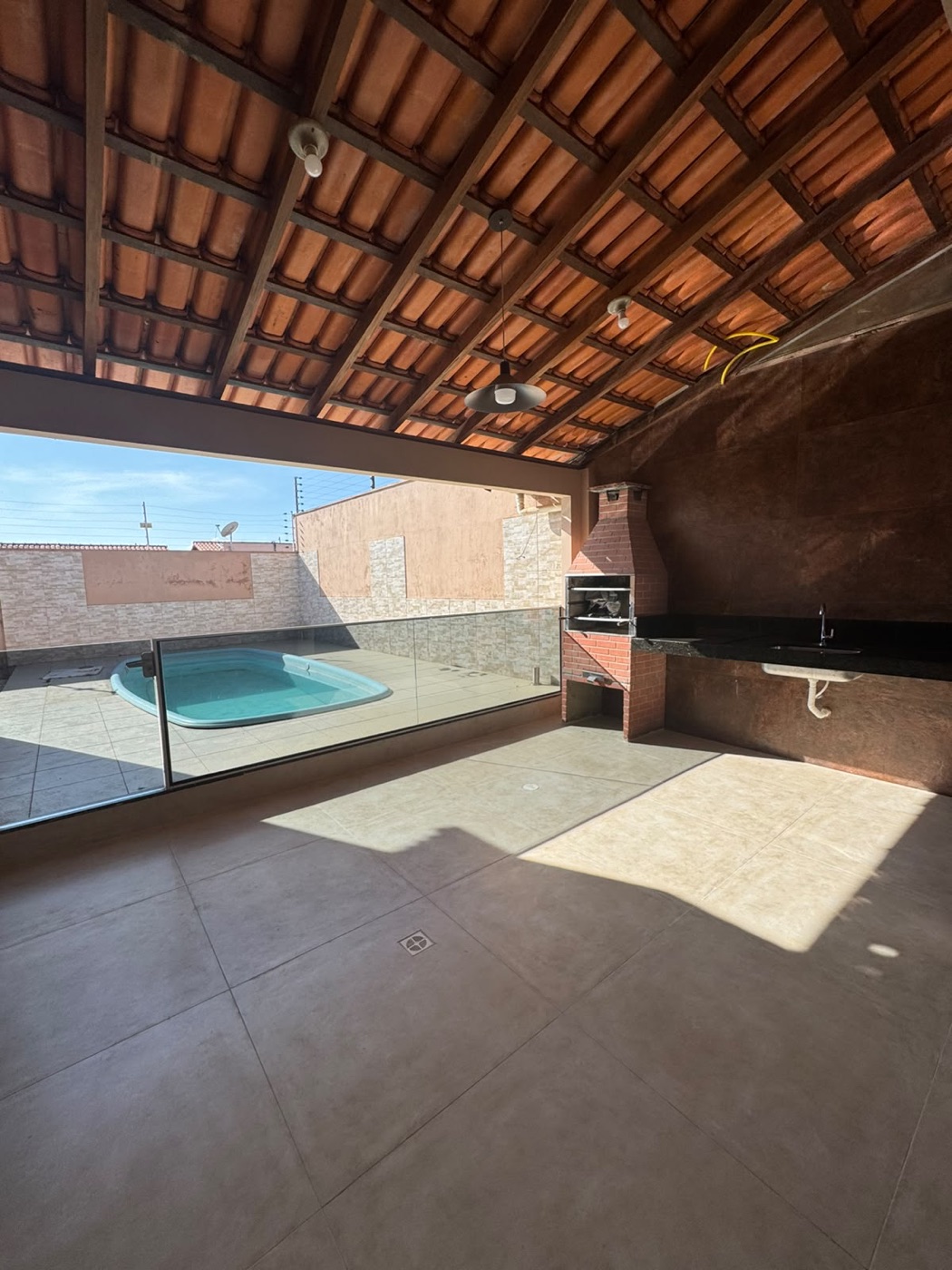 Área gourmet com piscina de casa para alugar